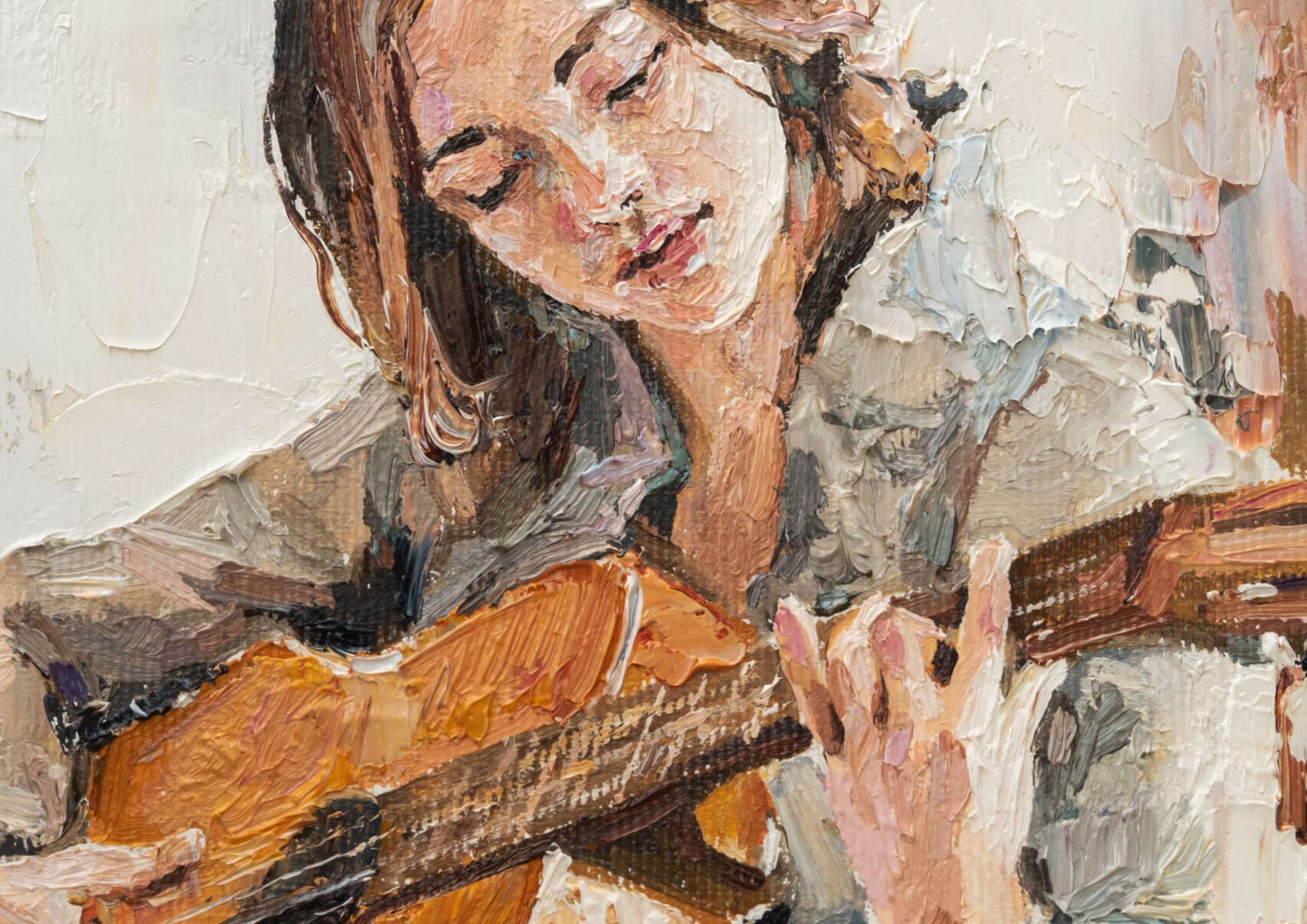Slika žene koja svira gitaru
